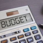Budgeting on a calculator, budget, tax, business, fun, price, money, profit, margin, equity
